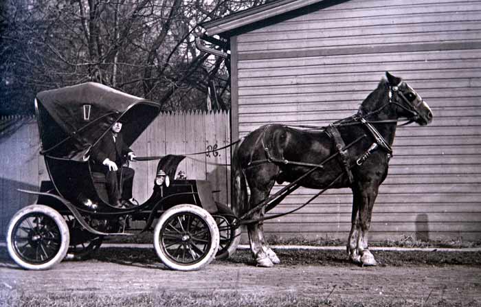 Henry Riddle with a battery-operated car
