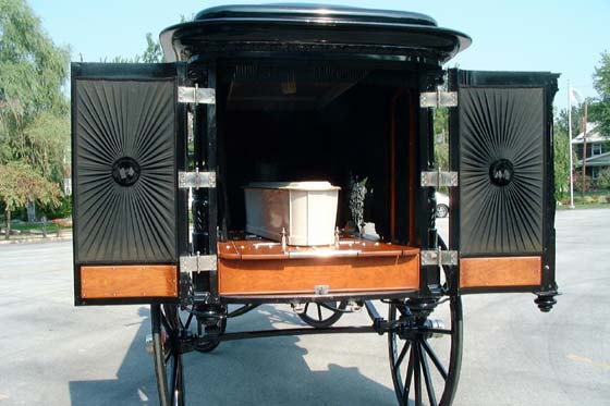 Oak Harbor Hearse — Inside — mahogany floor, upholstered back doors, ornate button