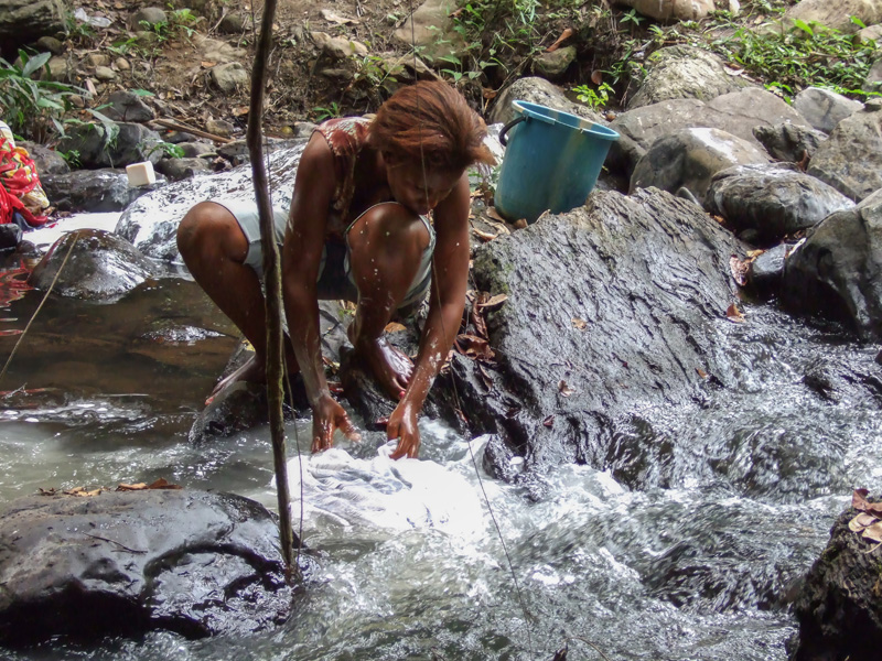 Washing clothes in the river